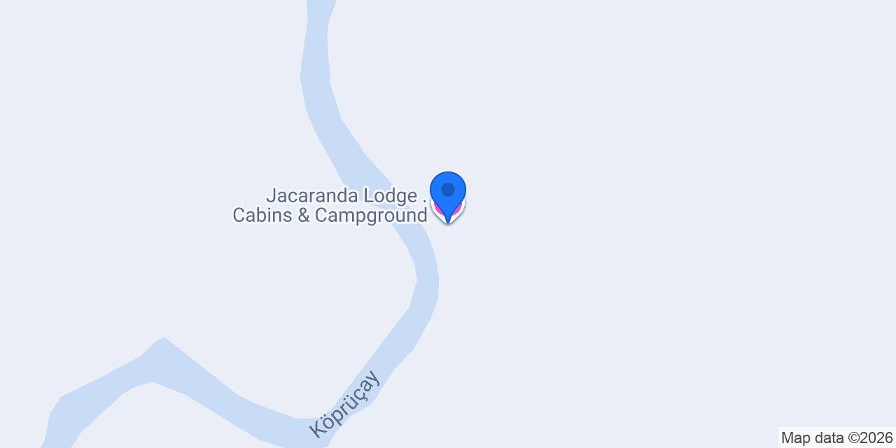 Jacaranda Lodge . Cabins & Campground konumu